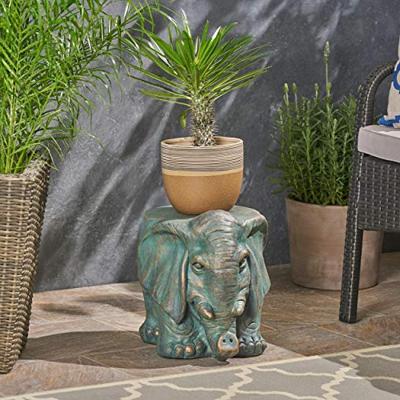 A Light Weight Concrete Elephant Garden Stool with a plant pot on its top - Decorating with garden stools – How to accessorize a garden stool