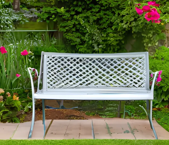 The Environmental Benefits of Cast Aluminum - green garden and cast aluminum bench