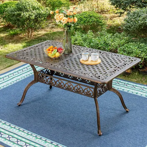 bronze_rectangular_cast_aluminum_table_on_a_patio_near_a_garden_and_pool - A1eiFJVyhvL